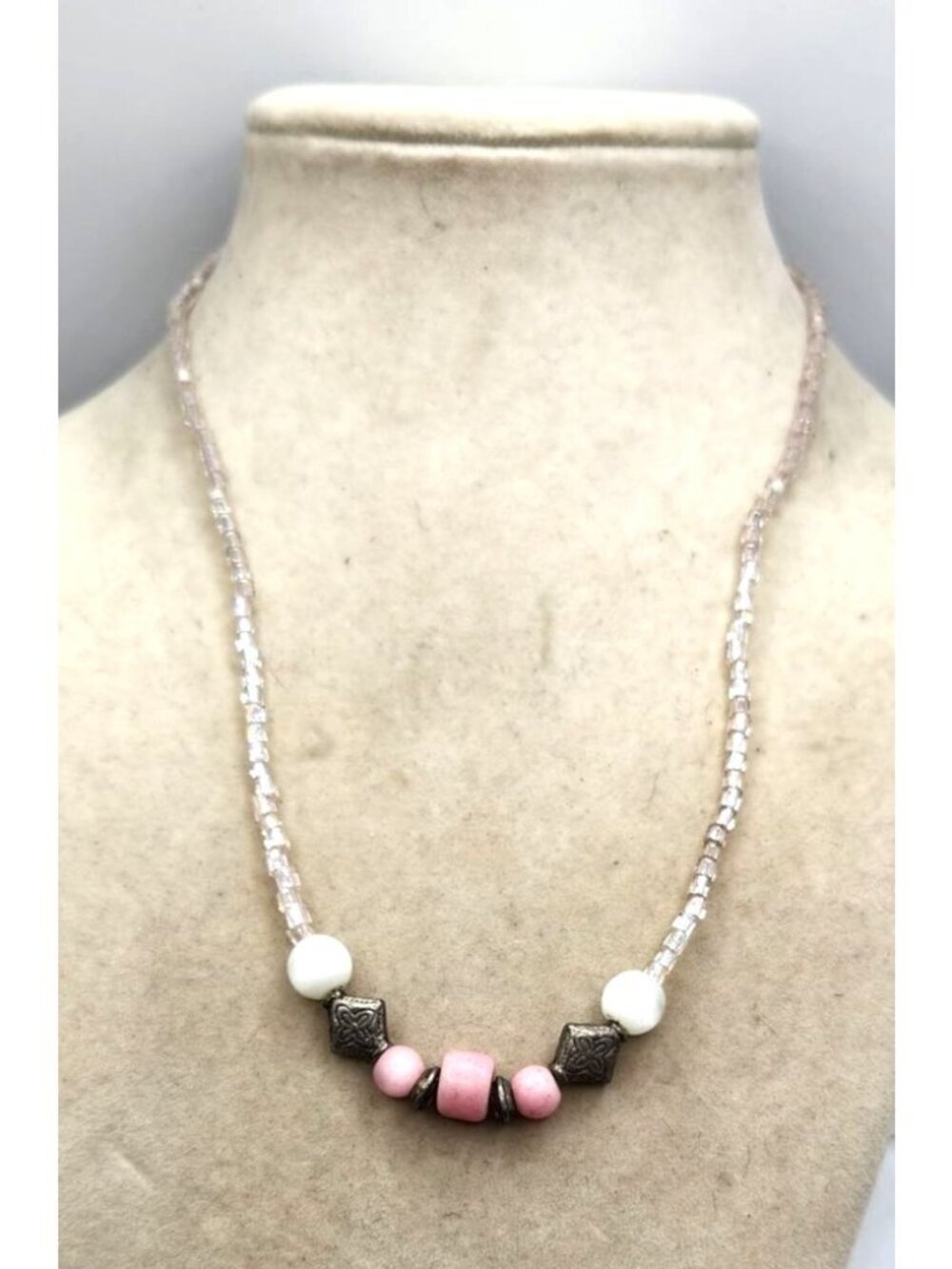 Beaded Necklace With Pink White & Silver Accents On Transparent Beaded Strand